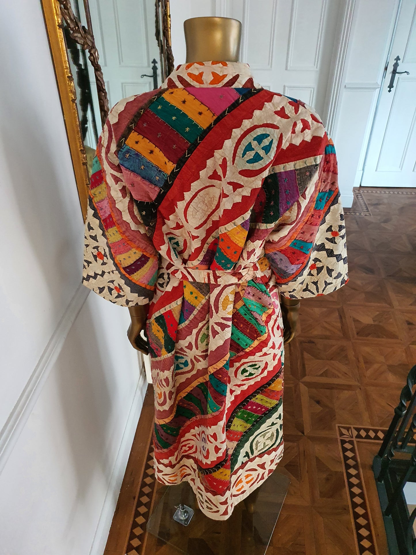 Multi colored appliqué ladies coat