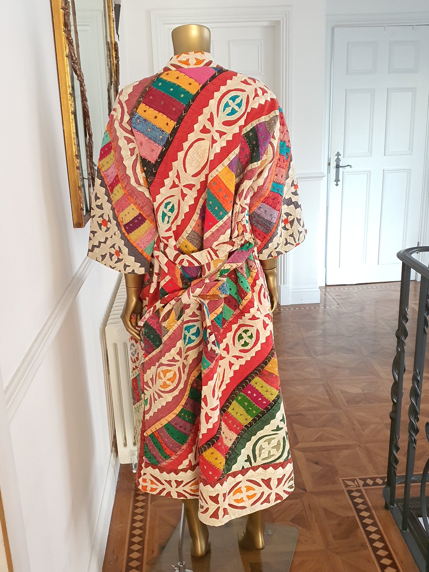 Multi colored appliqué ladies coat